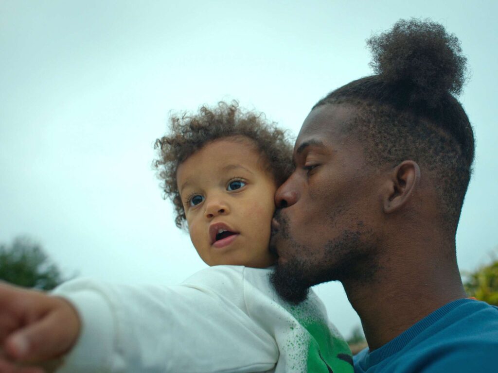 Jimmy Butler holding his daughter
