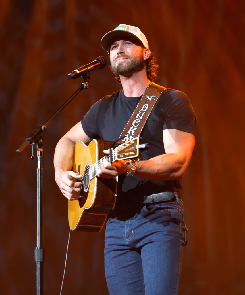 Riley Green performing his song