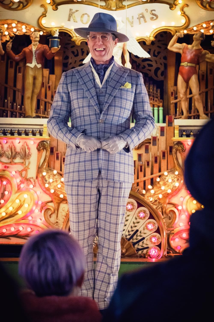 Hugh Grant as Phoenix Buchanan in the movie Paddington 2.
