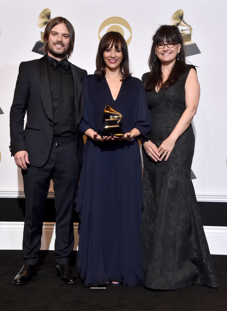 Alan Hicks, Rashida Jones, and Paula DuPré Pesmen celebrating a major win at the 61st Annual Grammy Awards