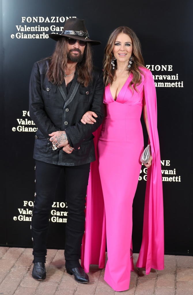 Elizabeth Hurley and Billy Ray Cyrus at an event