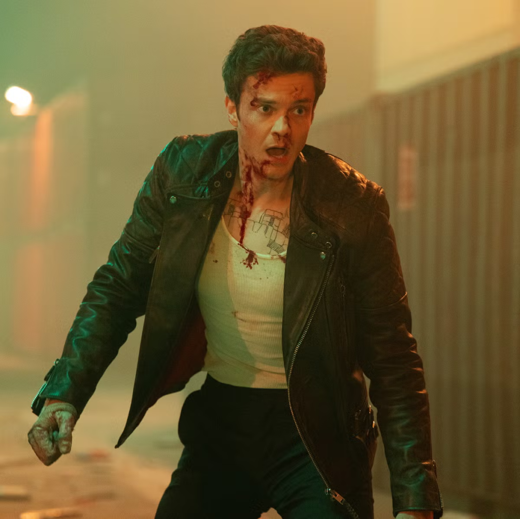 Jack Quaid as Nathan Caine in the 2025 action-comedy film Novocaine.
