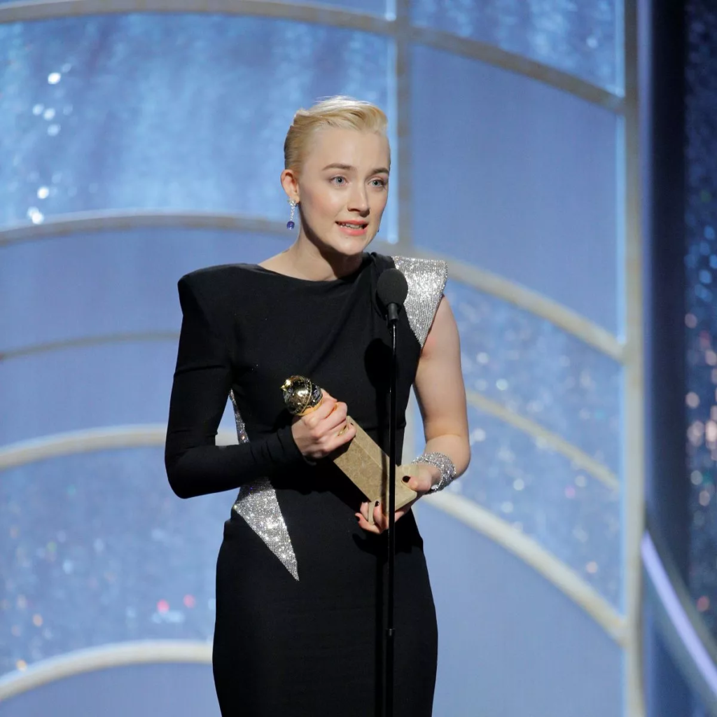 Saoirse Ronan receiving her Golden Globe Award