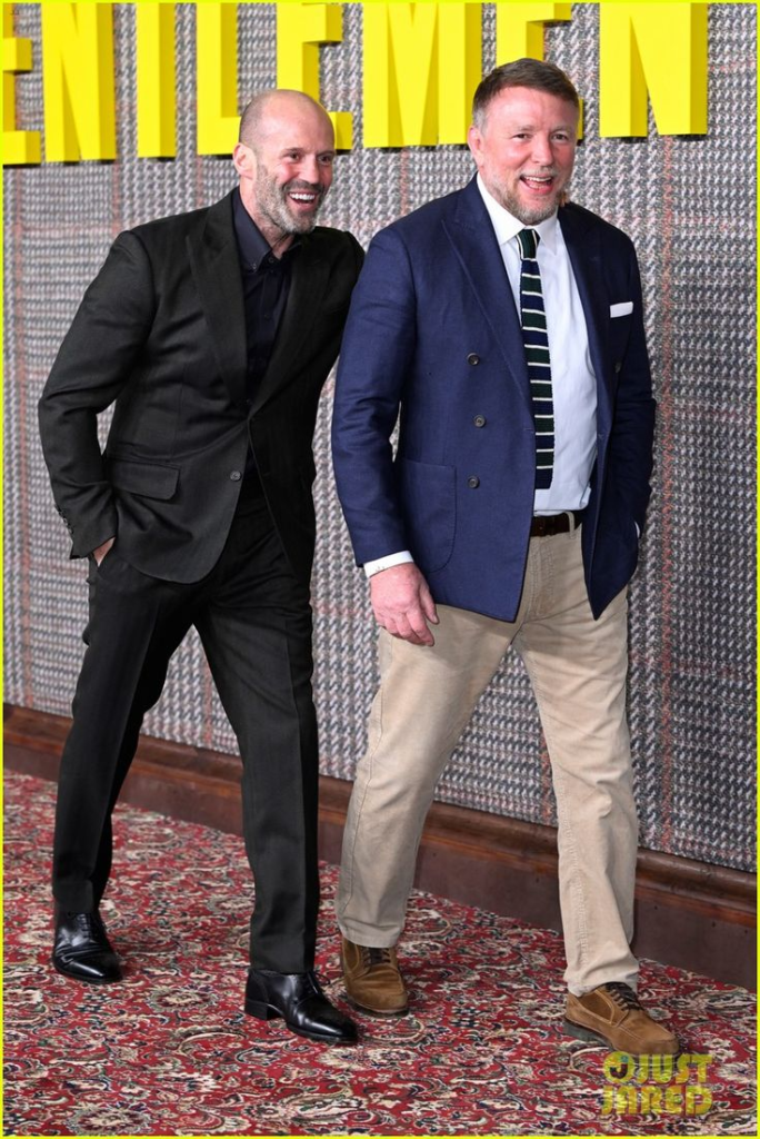 Guy Ritchie and Jason Statham at a movie premiere