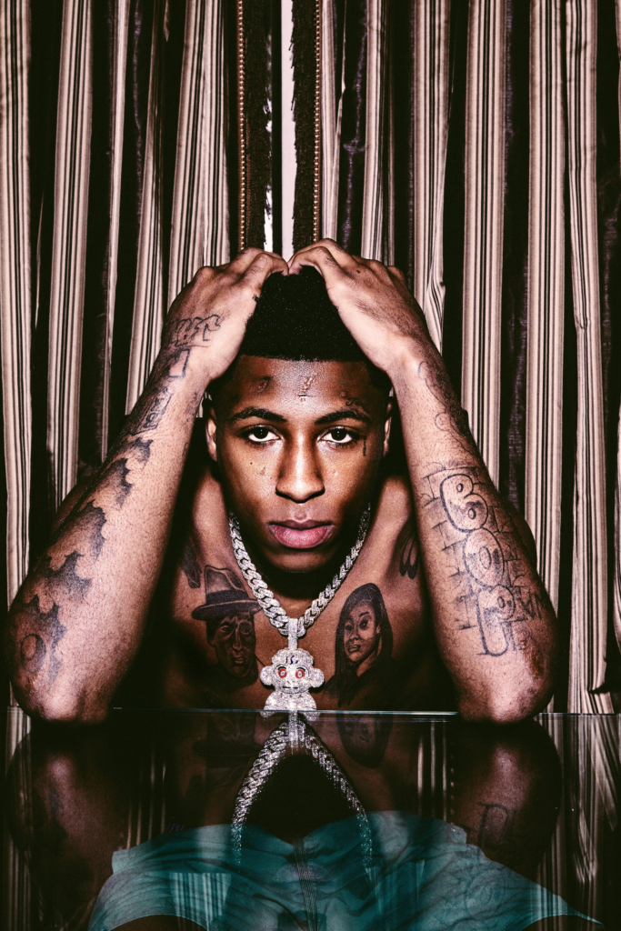 NBA YoungBoy showing off his tats