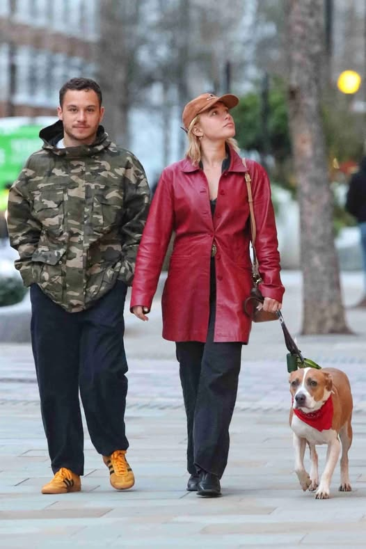 Florence Pugh and Finn Cole walking their dog