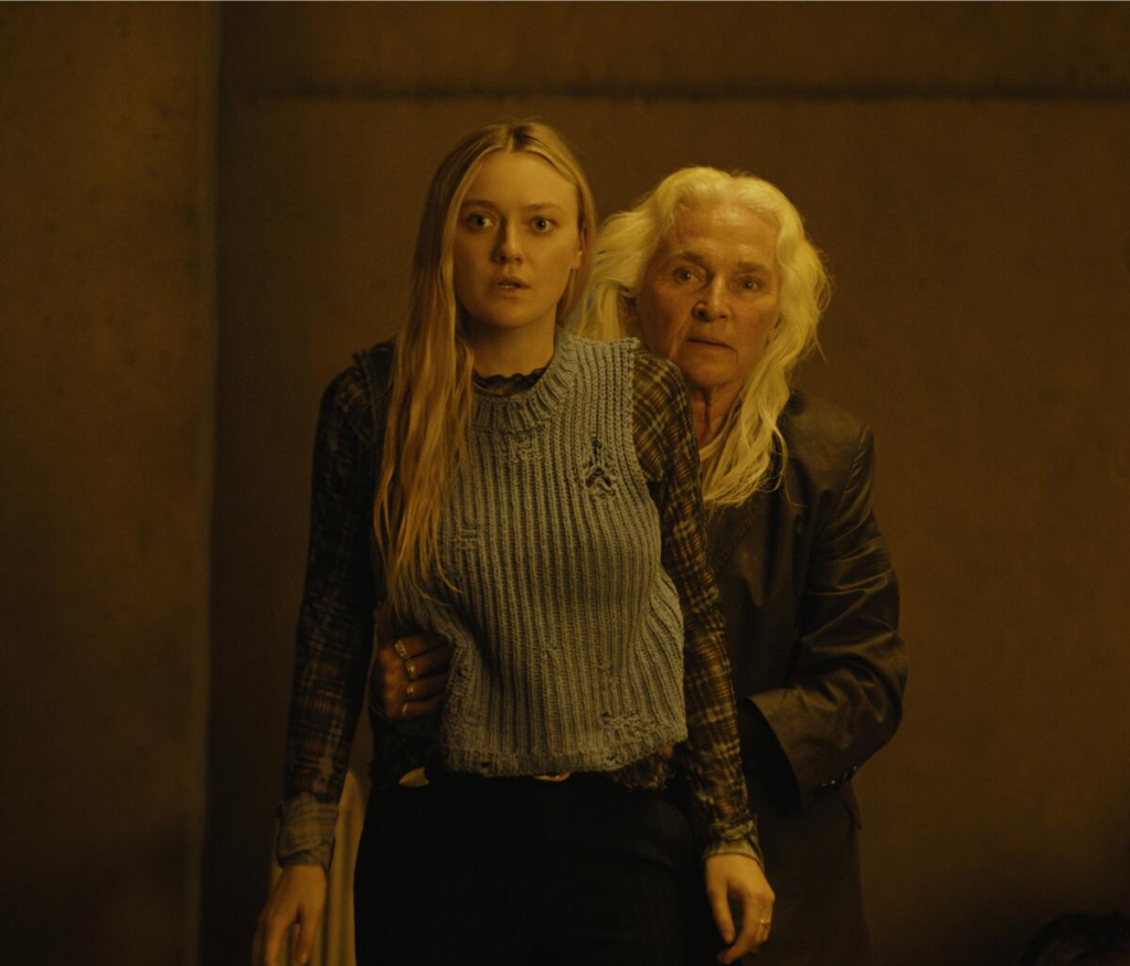 Dakota Fanning as Mina and Olwen Fouéré as Madeline in the 2024 horror film The Watchers