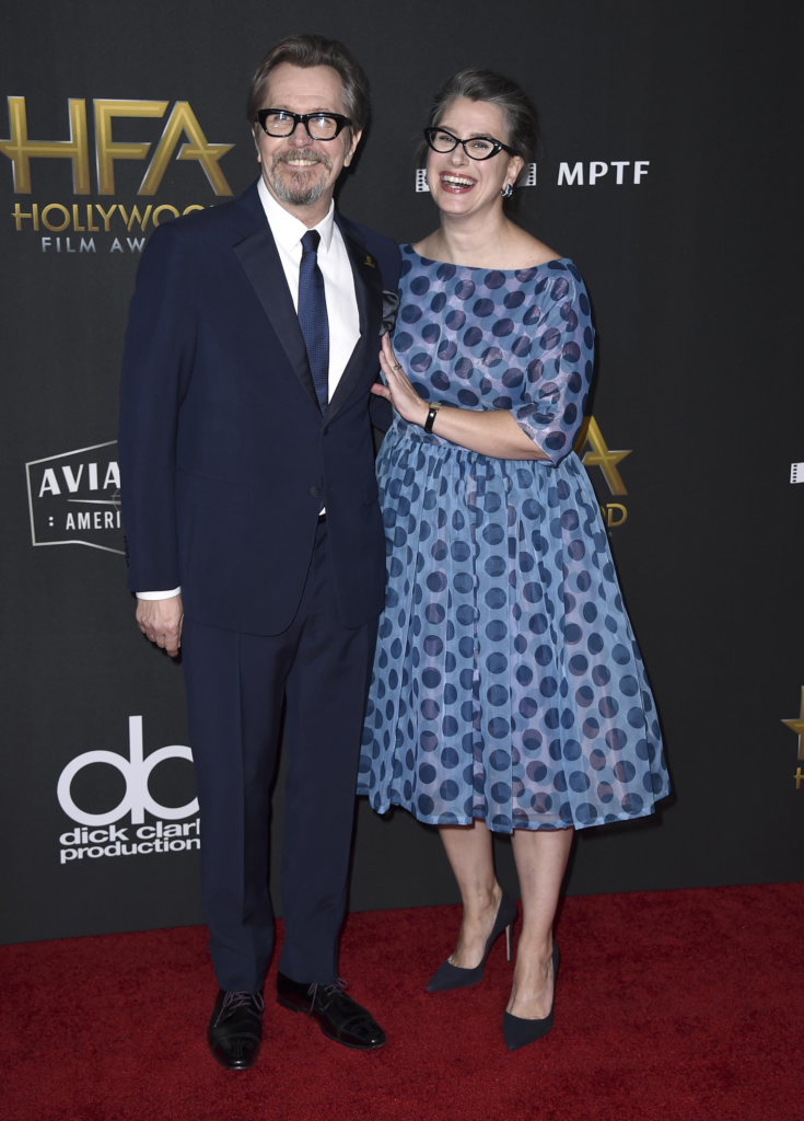 Gary Oldman and Gisele Schmidt