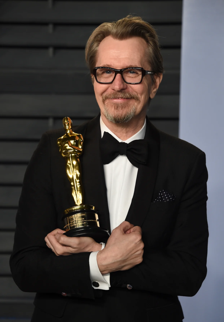 Gary Oldman celebrating his Oscar win
