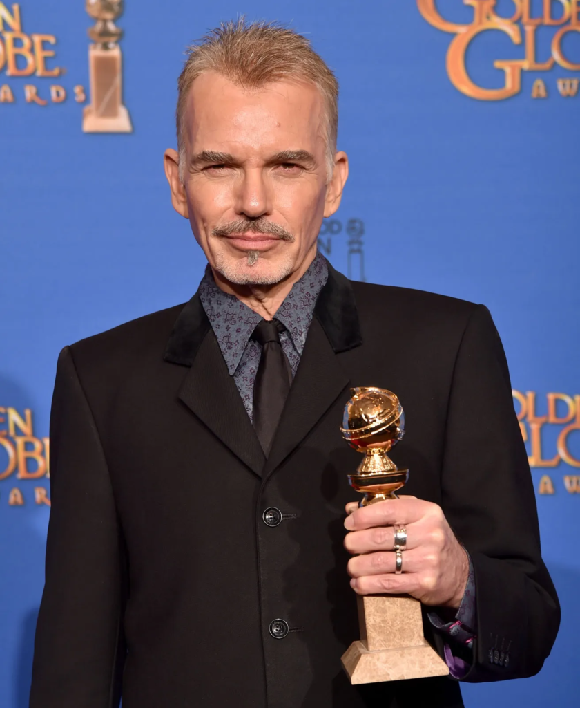 Billy Bob Thornton holding his Golden Globe