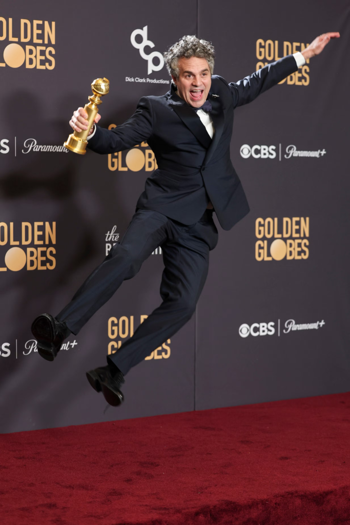 Mark Ruffalo celebrating his Golden Globe award win