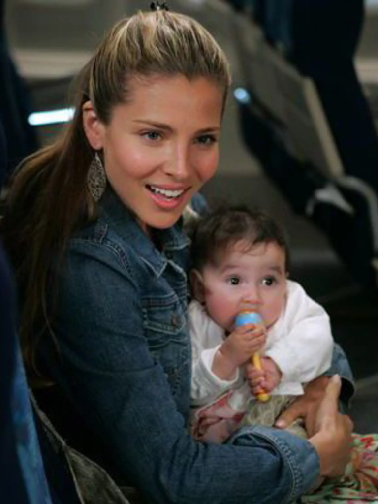 This image features actress Elsa Pataky in a scene from the 2006 film Snakes on a Plane. 
