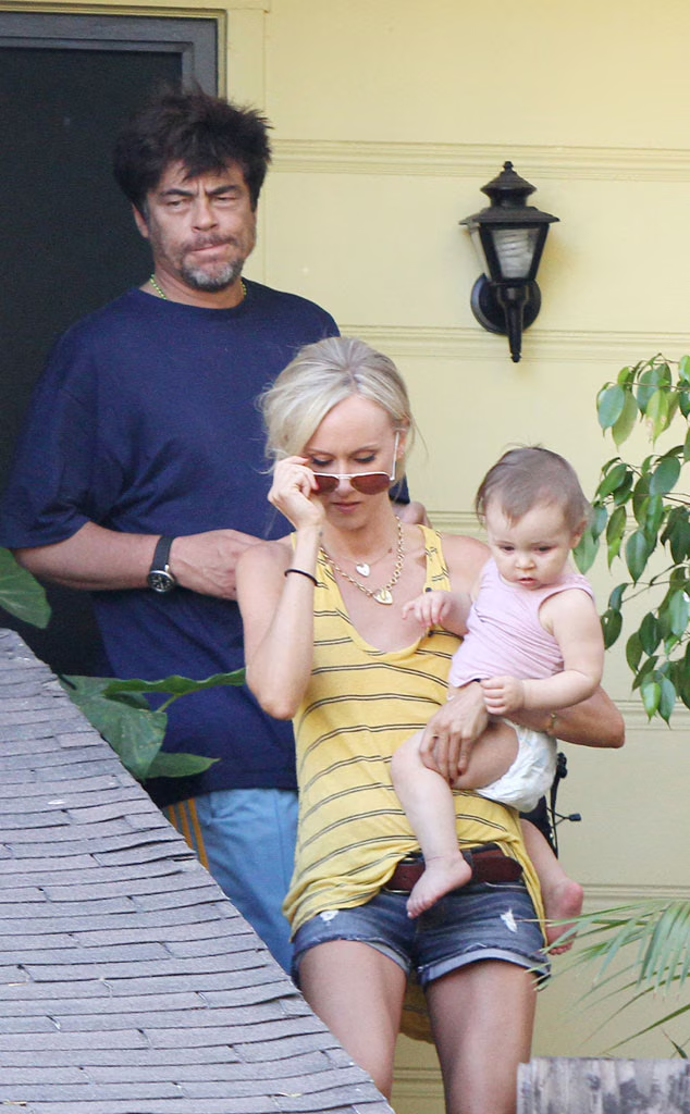 Benicio del Toro and Kimberly Stewart and their daughter