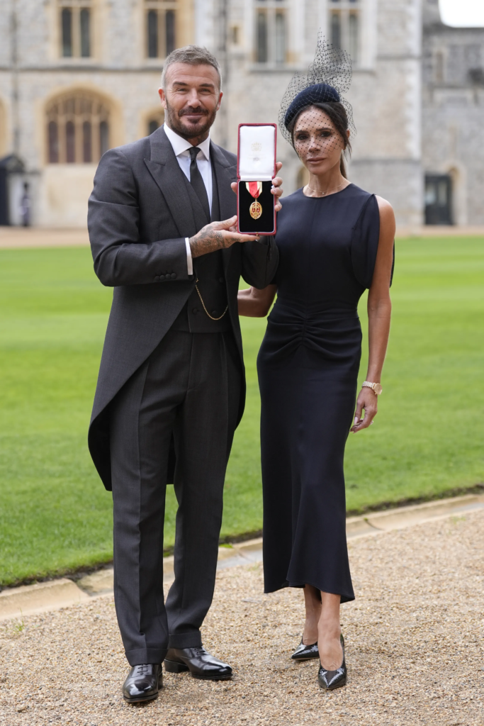 David Beckham and Victoria Beckham after he was knighted by King Charles III at Windsor Castle. 