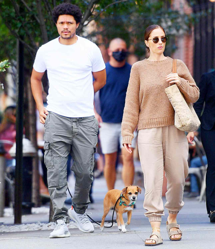 Trevor Noah and Minka Kelly walking their dog