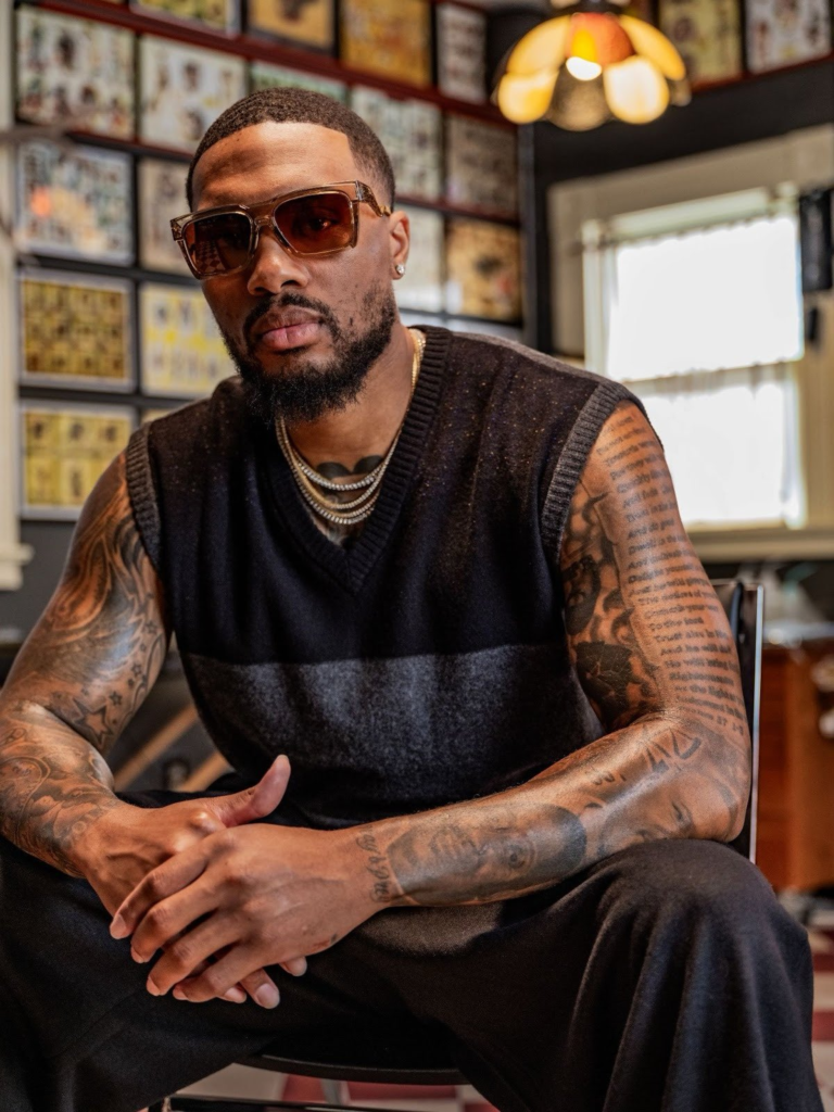 Damian Lillard rocking sunshade and showing off his sleeves tattoos
