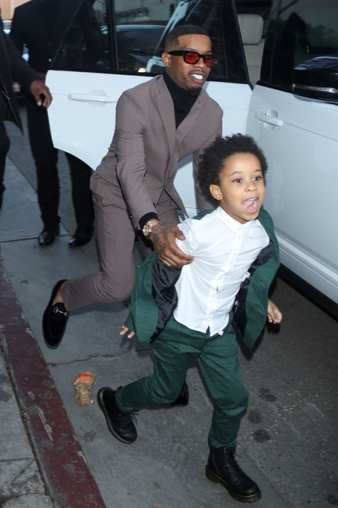 Tory Lanez playing with his son