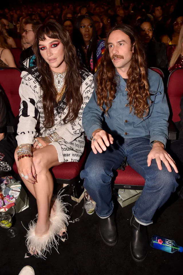 Kesha and Brad Ashenfelter at an event