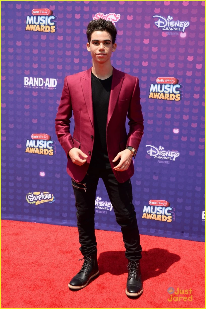 Cameron Boyce posing on the red carpet at the 2016 Radio Disney Music Awards