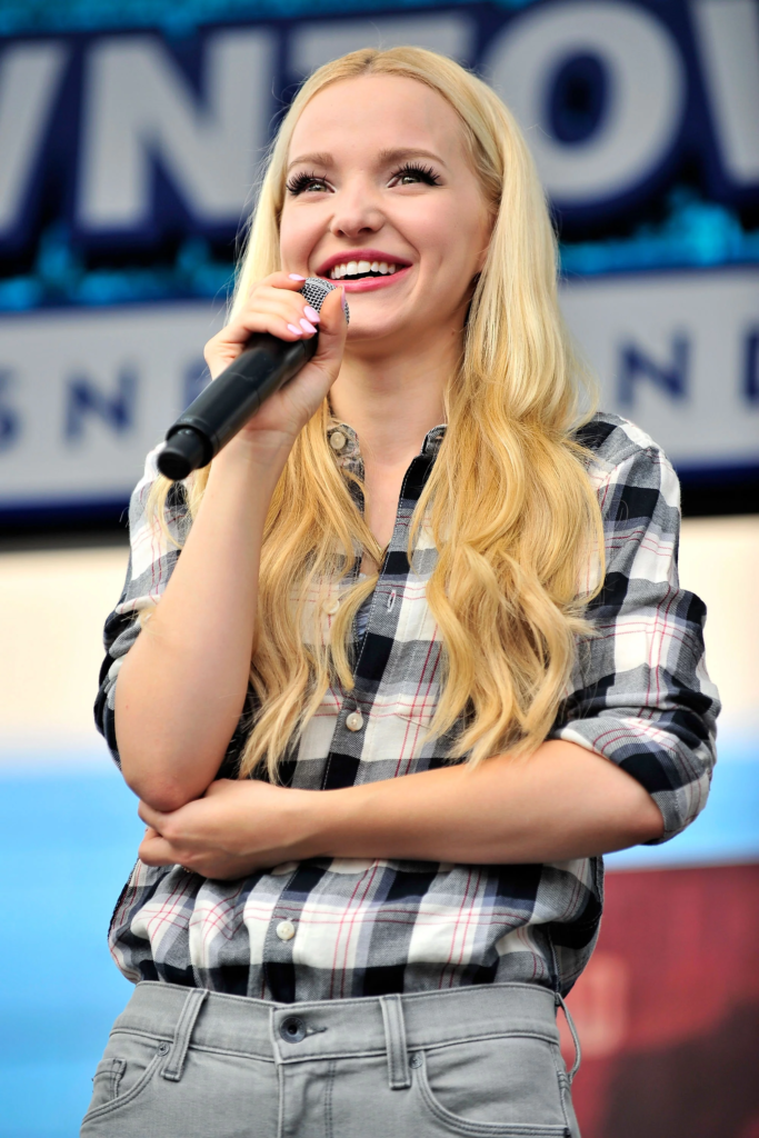 Dove Cameron performing at a Disney "Descendants" event