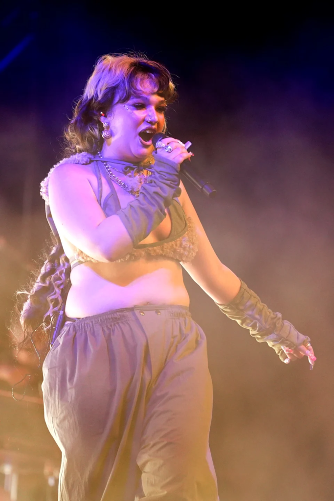 Lola Young performing on stage in the Mojave tent during the Coachella Valley Music and Arts Festival on April 11, 2025