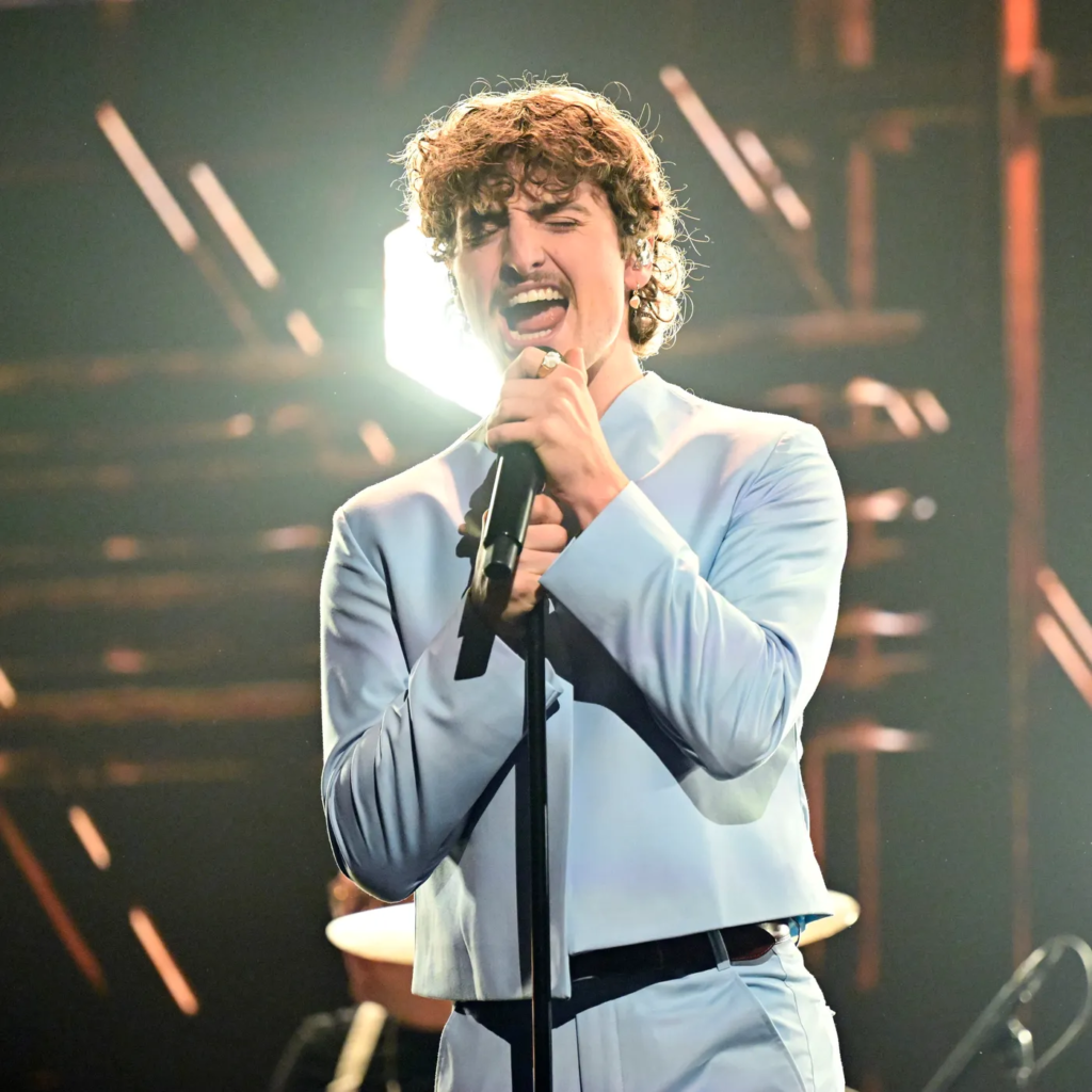 Benson Boone performing live on stage