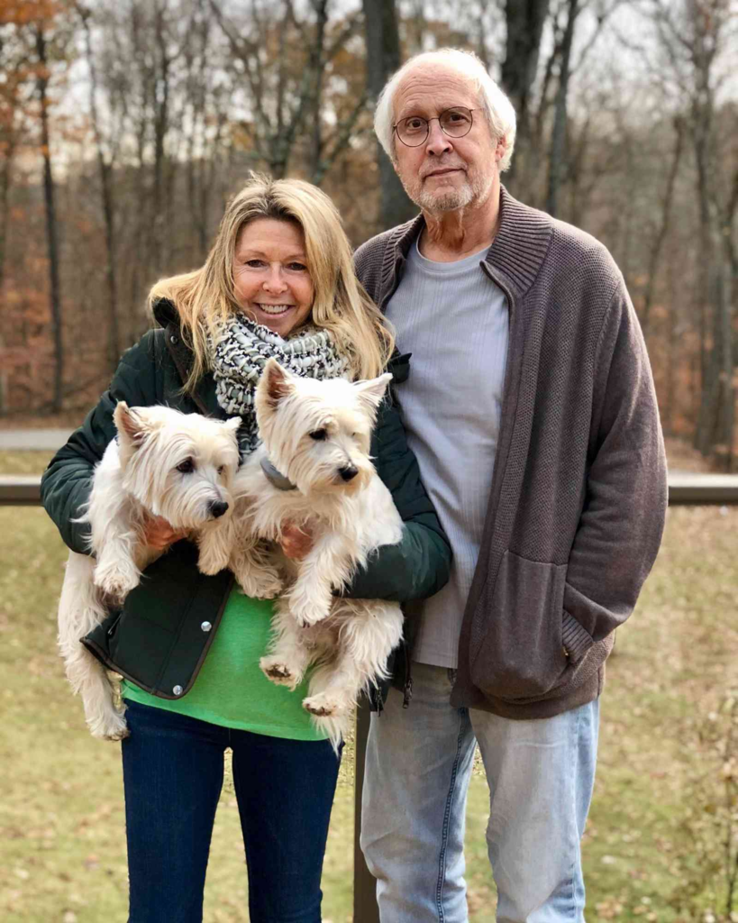 Chevy Chase and Jayni Chase with their dogs