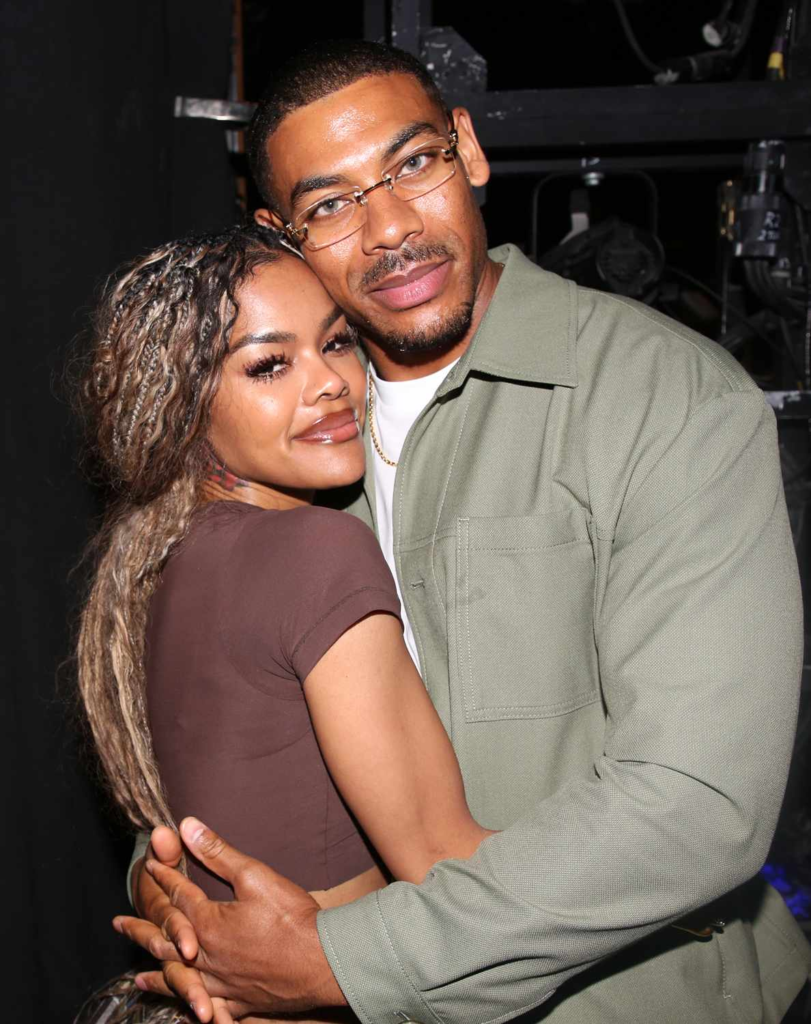 Aaron Pierre and Teyana Taylor embracing