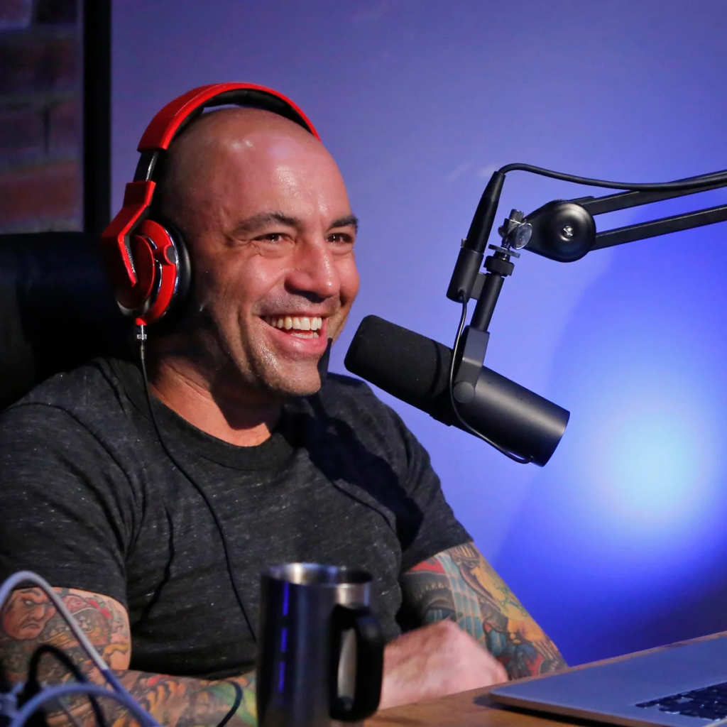 Joe Rogan smiling on his podcast