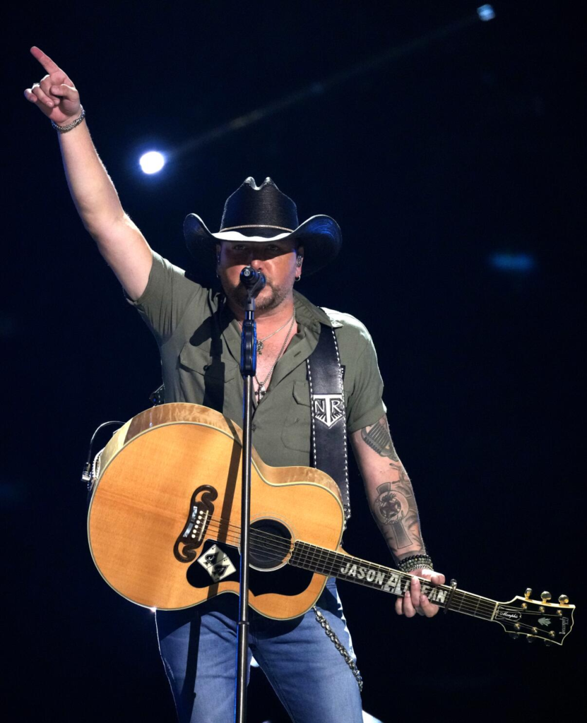 Jason Aldean performing on stage during a concert