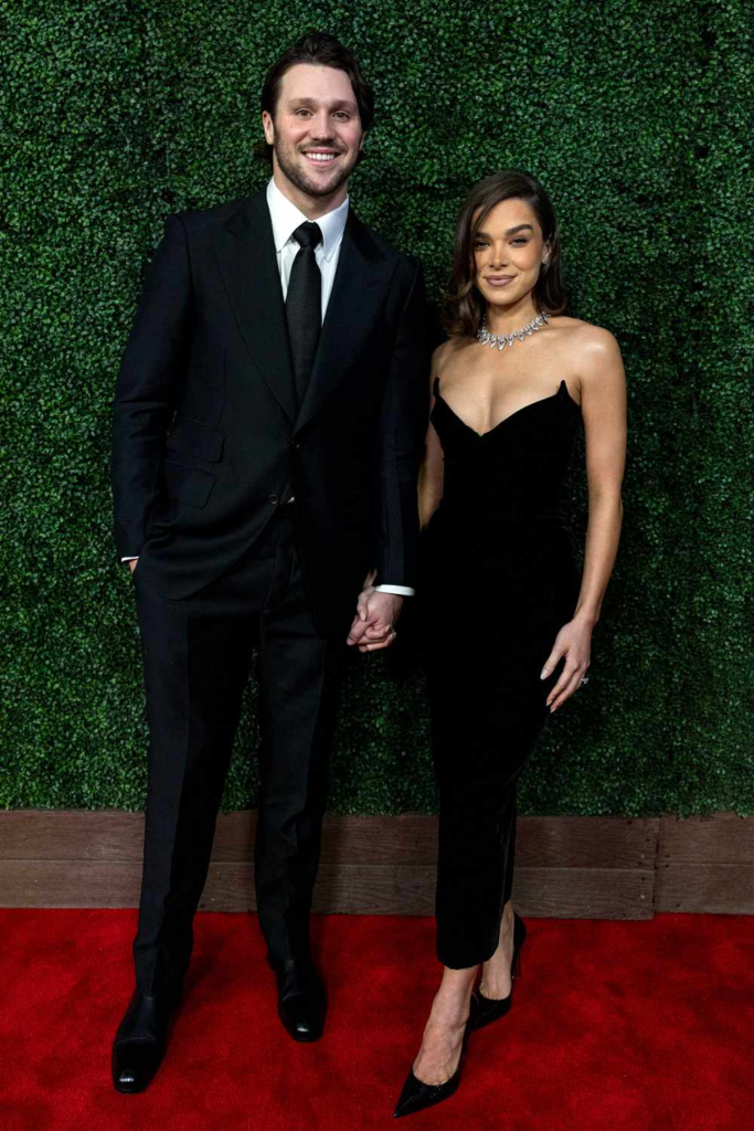 Josh Allen and Hailee Steinfeld holding hands