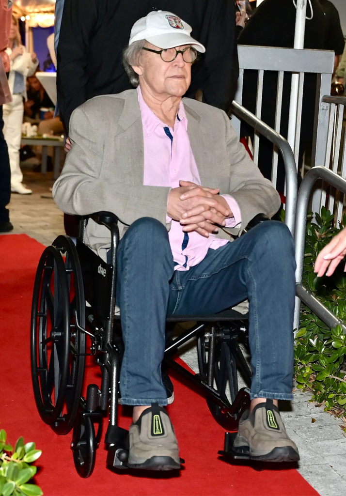 Chevy Chase's public appearance in a wheelchair
