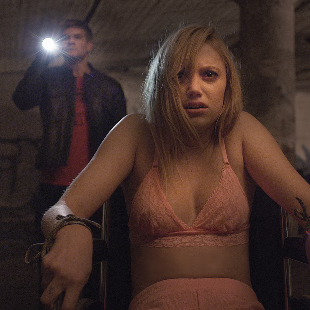 Maika Monroe in a scene from the 2014 horror film, It Follows