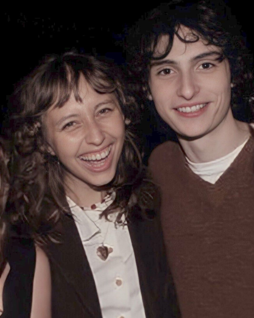 Finn Wolfhard and Elsie Richter laughing