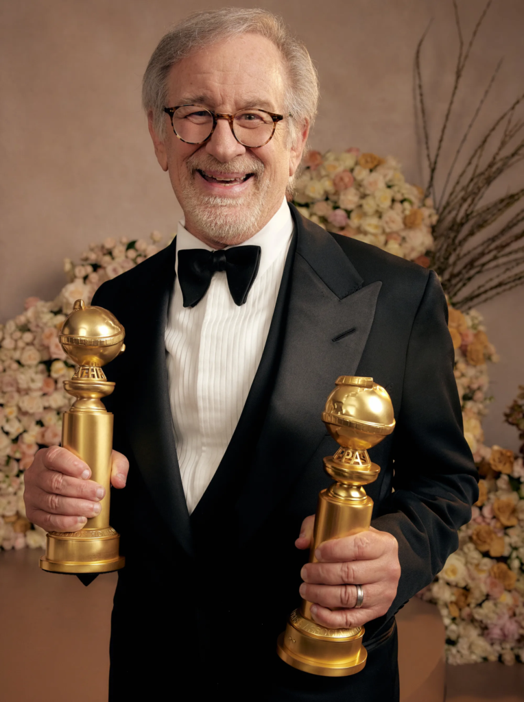 Steven Spielberg celebrating winning two Golden Globes
