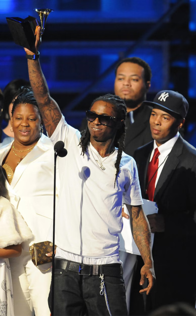 Lil Wayne celebrating with a Grammy Award at the 51st Annual Grammy Awards on February 8, 2009