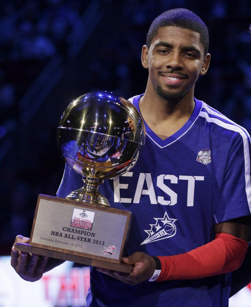 Kyrie Irving holding the trophy after winning the NBA All-Star Three-Point Contest on February 16, 2013