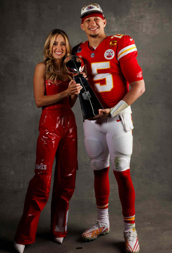 Patrick Mahomes celebrating a Super Bowl victory with his wife, Brittany Mahomes