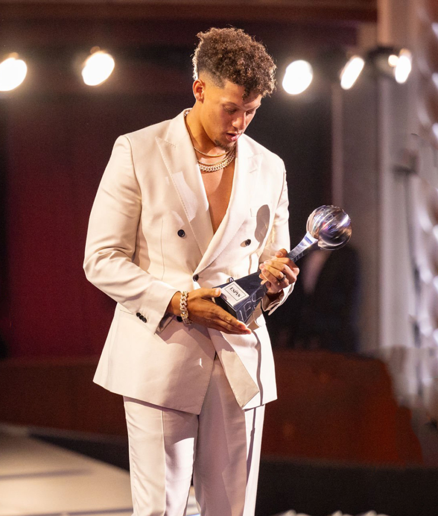 atrick Mahomes holding an award at the 2023 ESPY Awards