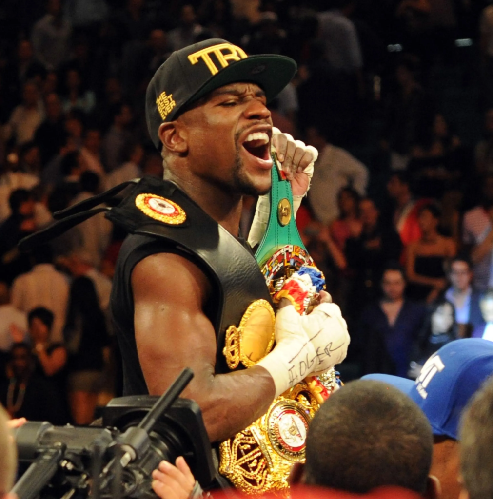 Floyd Mayweather Jr. celebrating after his victory over Saul "Canelo" Álvarez on September 14, 2013