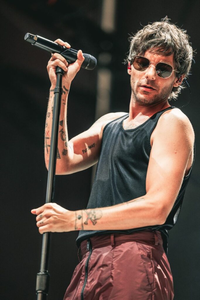Louis Tomlinson performing on stage during his 'Faith In The Future World Tour' at Forest Hills Stadium in Queens, New York, on July 29, 2023