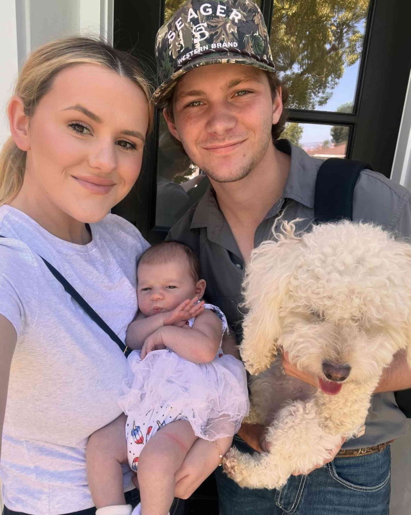 Montana Jordan and Jenna Weeks with their baby and dog