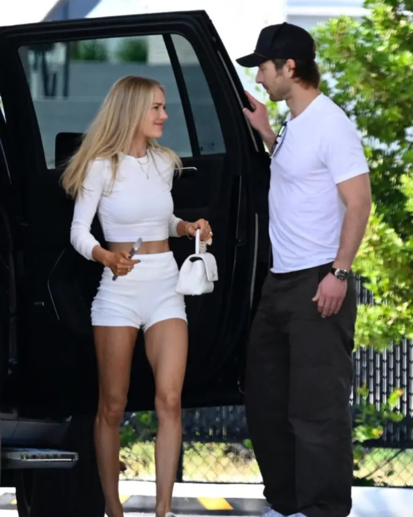 Michelle Randolph and Glen Powell