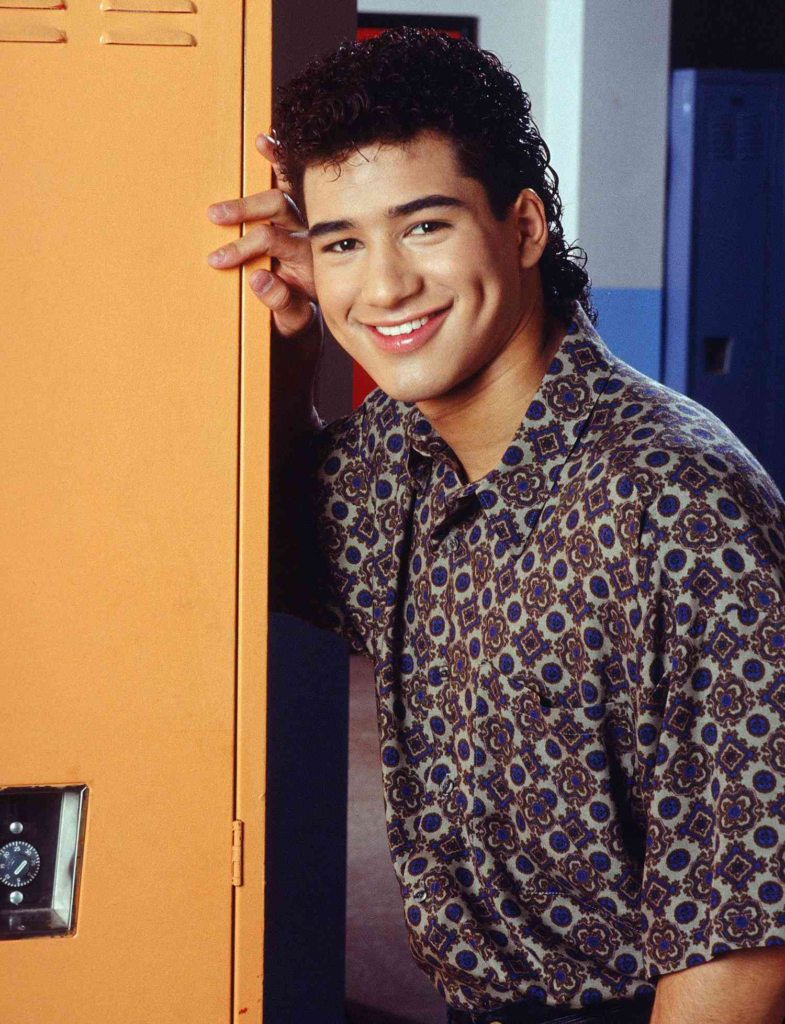 Mario Lopez in his iconic role as A.C. Slater from the original Saved by the Bell series