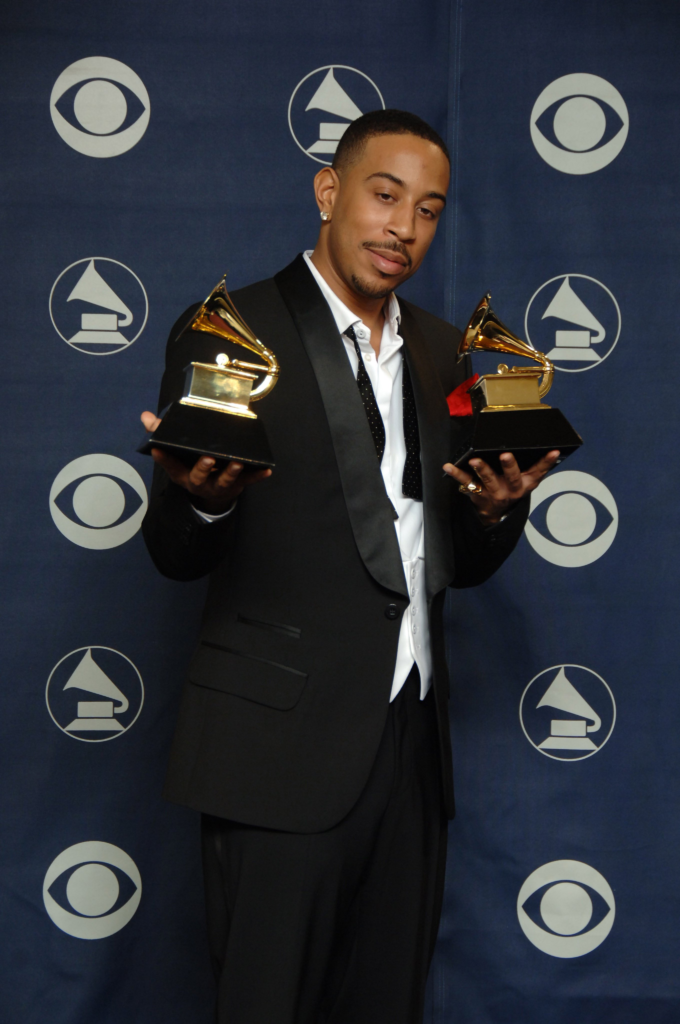 Ludacris posing with the two awards he won at the 49th Annual Grammy Awards in 2007