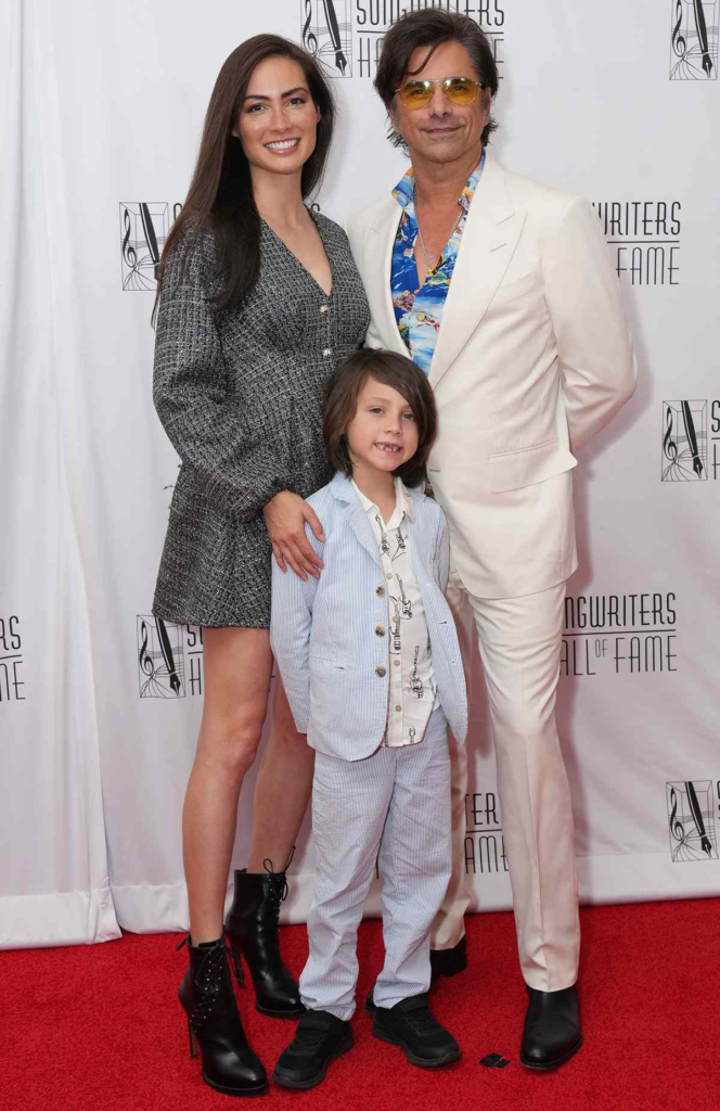 John Stamos, Caitlin McHugh, and their son Billy at the 2025 Songwriters Hall of Fame induction ceremony