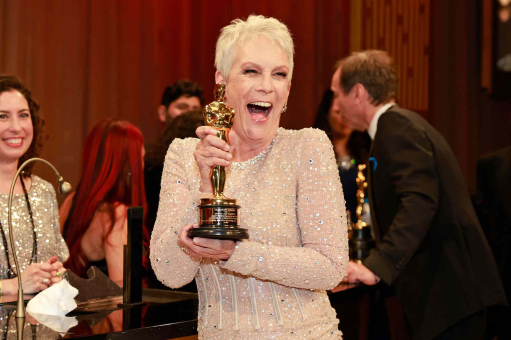 actress Jamie Lee Curtis celebrating her Best Supporting Actress win for Everything Everywhere All at Once at the 95th Academy Awards