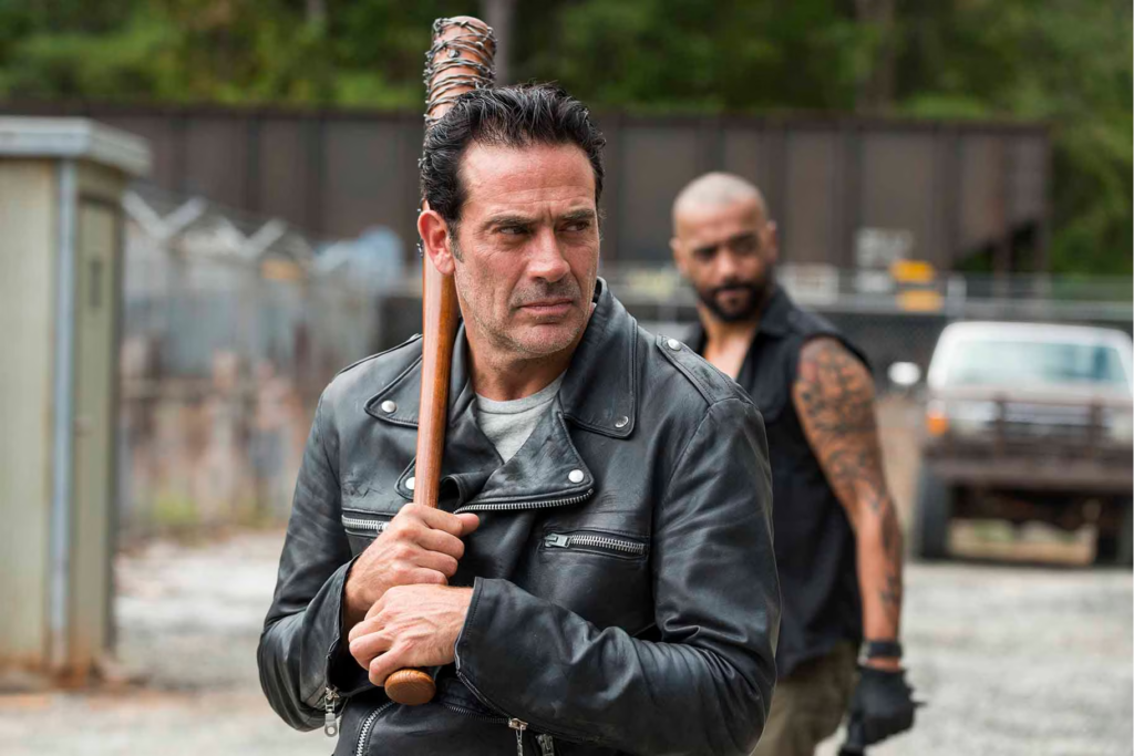 Jeffrey Dean Morgan as Negan from The Walking Dead, featuring his iconic leather jacket and baseball bat