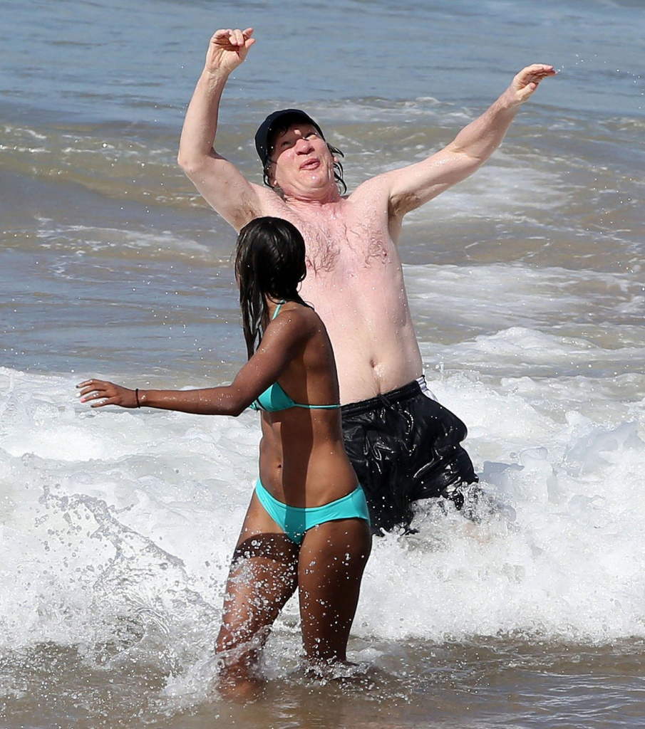 Bill Maher and Anjulie Persaud at the beach