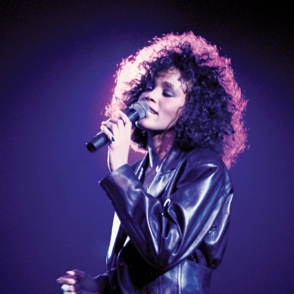legendary singer Whitney Houston performing live on stage